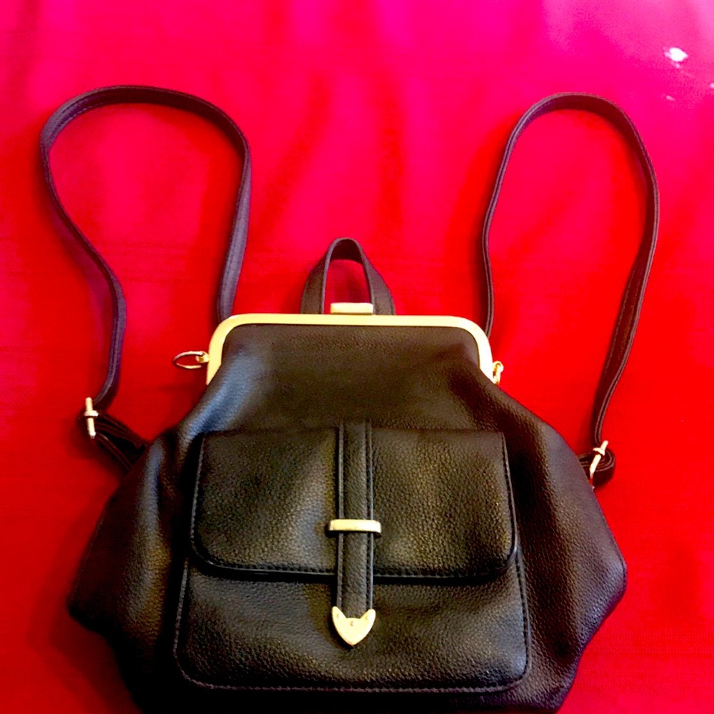Ultimate feminine black faux leather backpack purse w interior b&w polka dots!